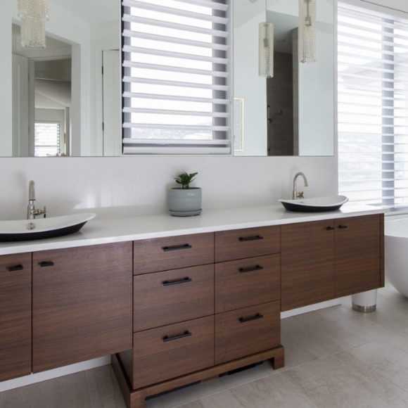 Bathroom with custom dark wood cabinets