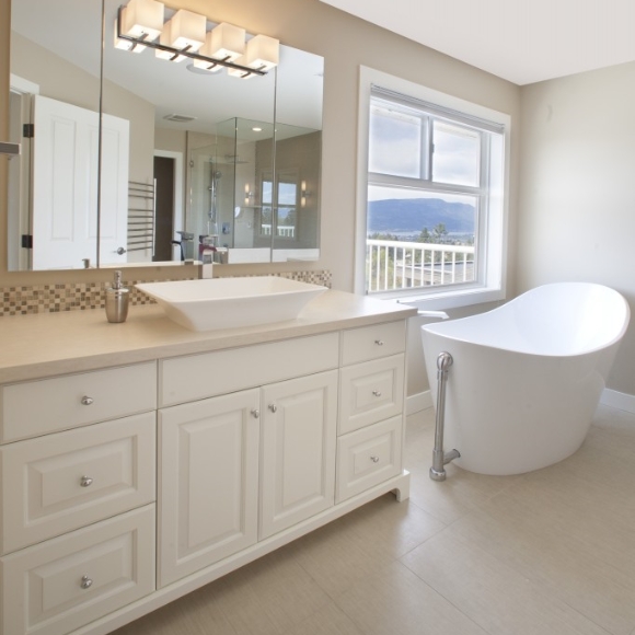 Bathroom with custom white cabinets